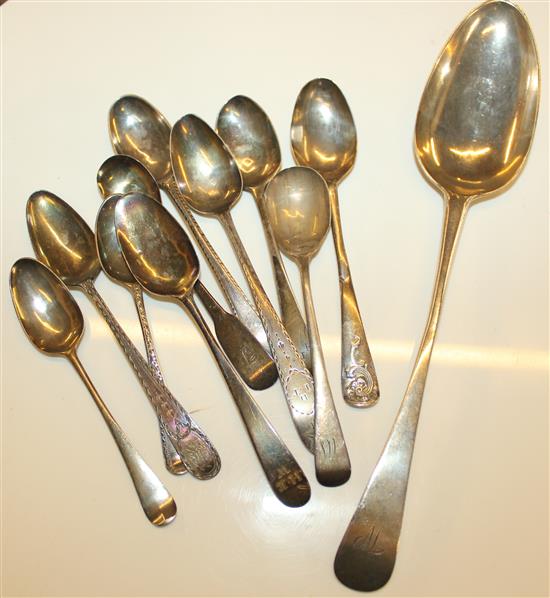 Ten18th/19th century teaspoons and a Newcastle table spoons